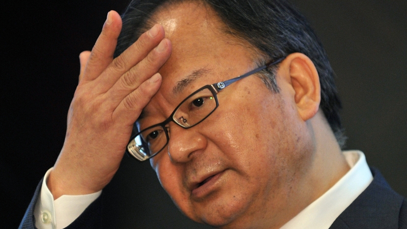 Sharp president Takashi Okuda announced the job cuts at a press conference today