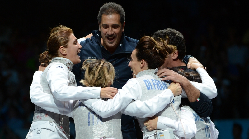 The Italian team celebrates winning gold during the women's foil final