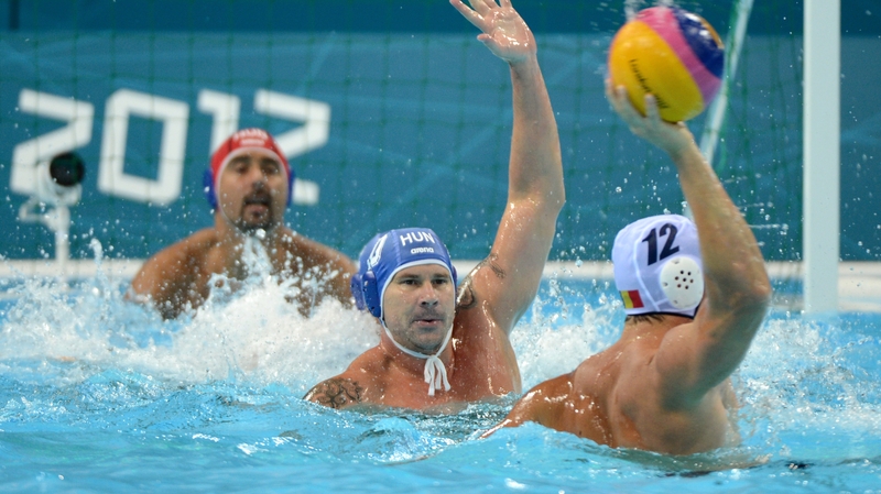 Hungary’s Peter Biros attempts to block a shot on goal in the victory over Romania