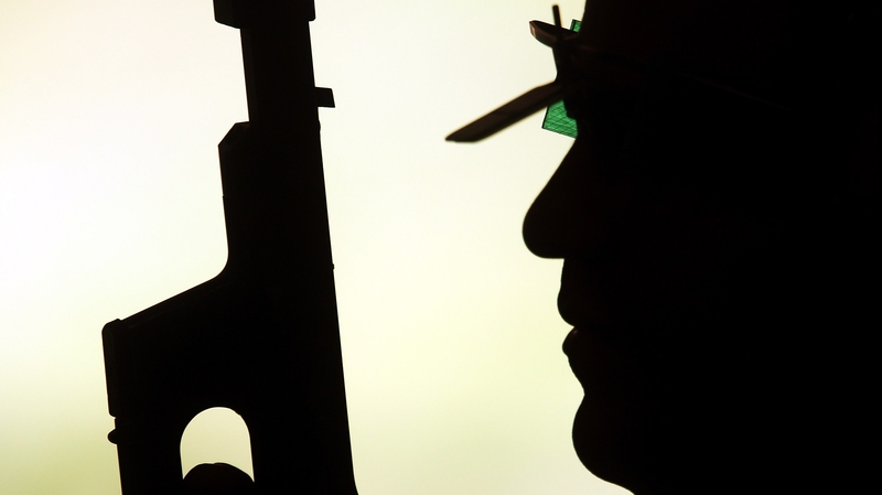 Leuris Pupo of Cuba prepares for a practice session with his pistol ahead of the Beijing 2008 Olympics