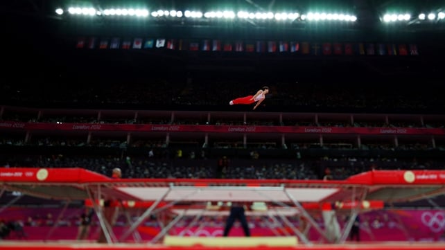A tilt-shift view of Yasuhiro Ueyama in the men's trampoline