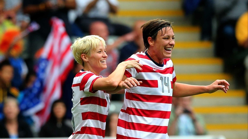 Abby Wambach (r) celebrates with US team-mate Megan Rapinoe after scoring against New Zealand