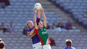 Diarmuid O'Connor of Mayo and Colman Kennedy of Tipperary compete for a high ball in the MFC quarter-final at Croke Park