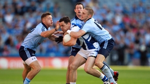 John O'Loughlin of Laois is surrounded by Dublin trio Paul Flynn (l), Denis Bastick and Eoghan O'Gara (r)