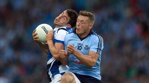 Dublin's Paul Flynn barges into the back of Colm Begley of Laois