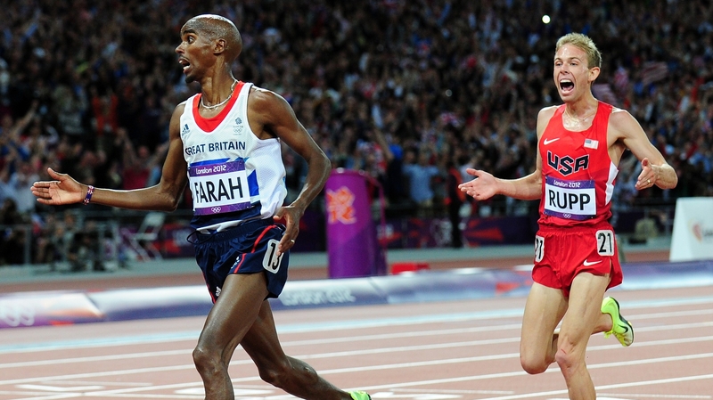 Mo Farah crosses the line to take 10,000m gold followed by training partner Galen Rupp from the USA
