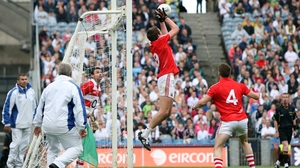 Cork's Aidan Walsh gathers a free that drops short of the crossbar