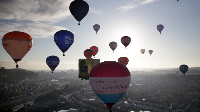 Hot air balloons take to the skies over Bristol in England as part of the city’s balloon festival