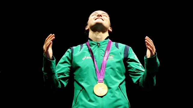 Katie Taylor looks to the heavens after winning Olympic gold in the women's lightweight division