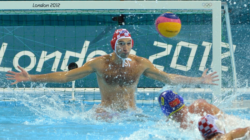 Croatia's Josip Pavic attempts to stop the ball