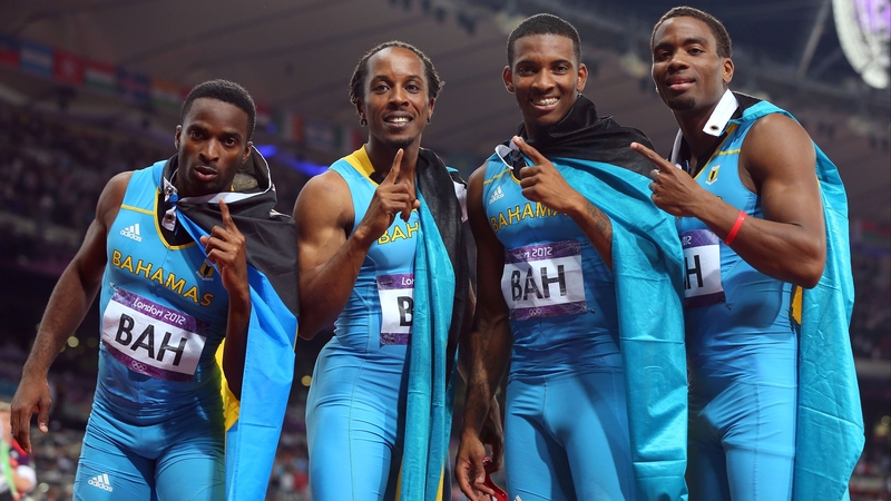 Chris Brown, Demetrius Pinder, Michael Mathieu and Ramon Miller celebrate gold
