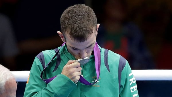 John Joe Nevin kisses his silver medal