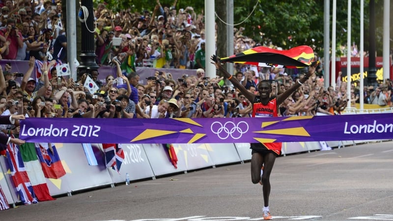 Stephen Kiprotich crosses the winning line