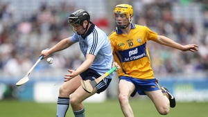 Dublin's Sean McClelland shields possession from Shane Taylor of Clare