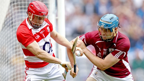 Cork goalkeeper Anthony Nash is challenged by Galway's Conor Cooney