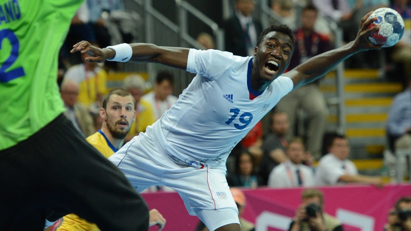 France's rightwing Luc Abalo attempts to shoot past Sweden's goalkeeper Johan Sjostrand during the Men's Handball final