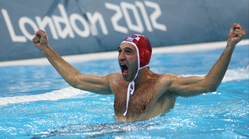 Goalkeeper Josip Pavic of Croatia celebrates after winning gold
