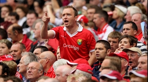 A Cork supporter makes his view known