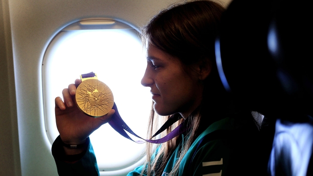 A quiet moment for Katie Taylor as she flies home from London 2012