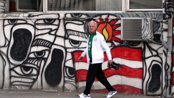 Giovanni Trapattoni makes his way to the dressing room prior to training at the Red Star Stadium in Belgrade