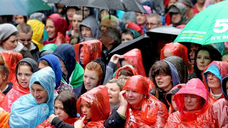 Despite bad weather, crowds gathered outside the Mansion House