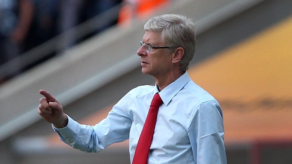 Arsene Wenger believes Arsenal were obliged to cash in on Robin van Persie