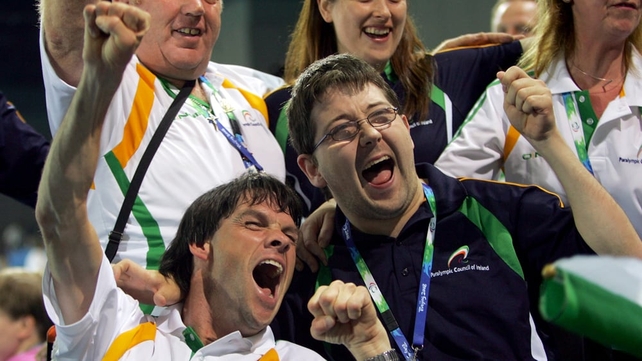 Gabriel Shelly celebrates his Bronze medal win in the Boccia Mixed Individual - BC1 with team-mate Padraic Moran