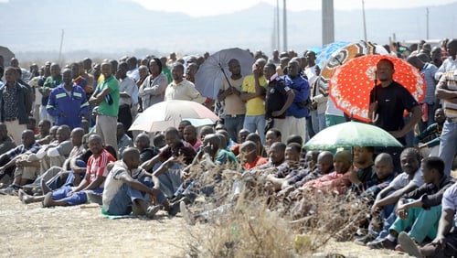 Striking platinum miners gathered yesterday at Lonmin's Marikana platinum mine