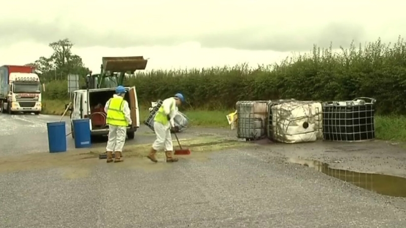 Six containers were dumped on the side of the road