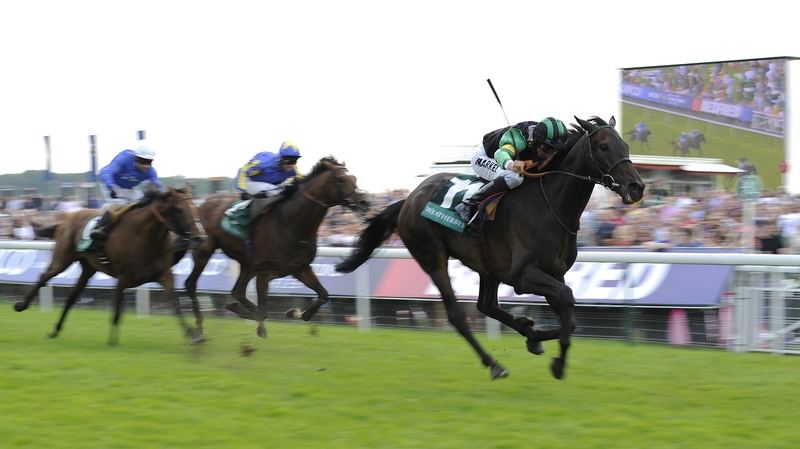 William Buick pushes the winner clear to land the Group 2 prize