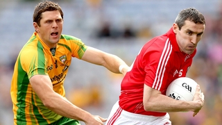 Donegal's Ryan Bradley chases Graham Canty of Cork