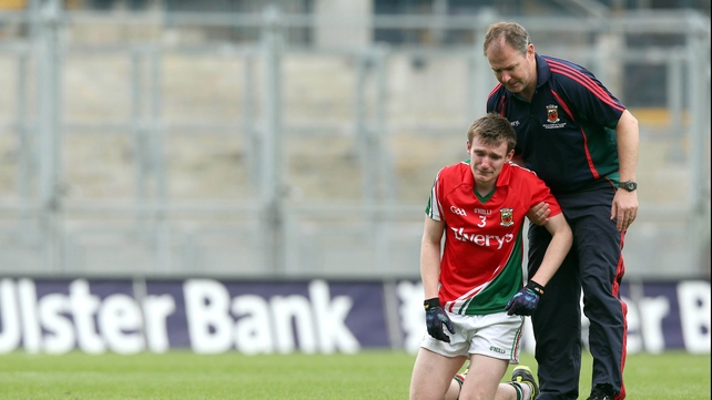 Sean Moran of Mayo is consoled after his side's 2-11 to 1-12 defeat