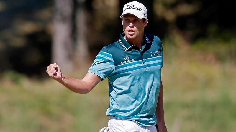 Watney shows his delight after making a birdie on the eight hole