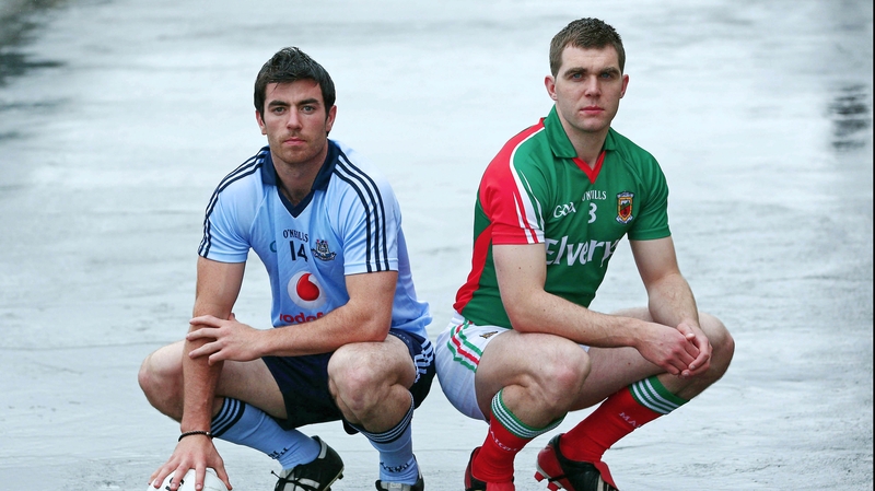 Dublin's Michael Darragh MacAuley and Mayo's Seamus O'Shea
