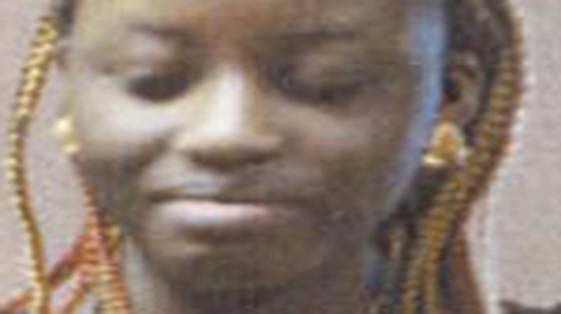 Roberta Oulai, is 5'6" in height, of slim build with brown eyes