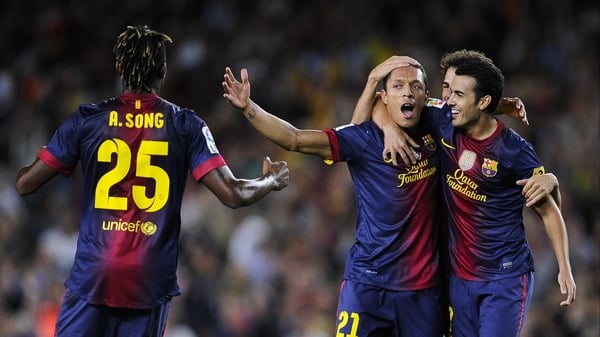 Barcelona celebrate Adriano's winner against Valencia
