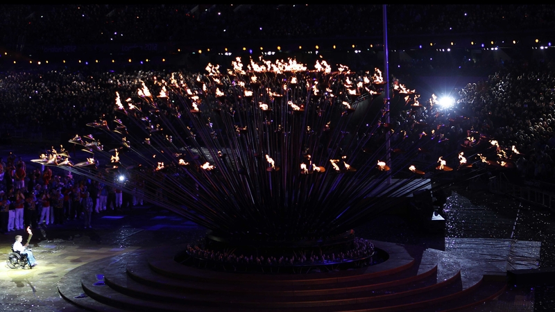 British former Paralympian Margaret Maughan lights the cauldron bearing the Paralympic flame at the opening ceremony