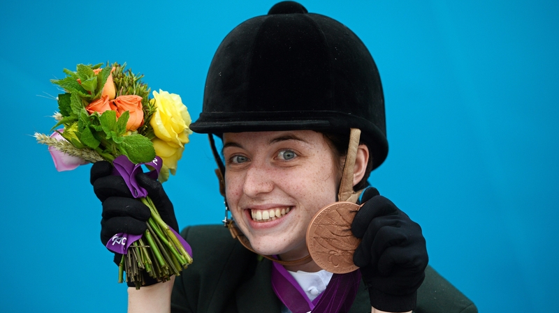 Kearney poses for the cameras with her bronze medal
