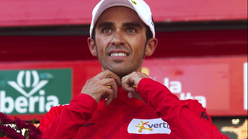 Alberto Contador dons the leader's red jersey at the Vuelta a Espana