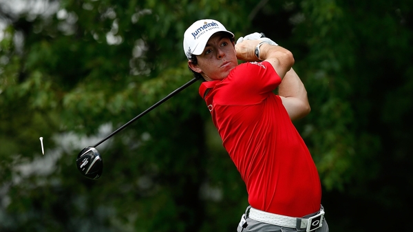 McIlroy's strong finish sees him in a share of the lead