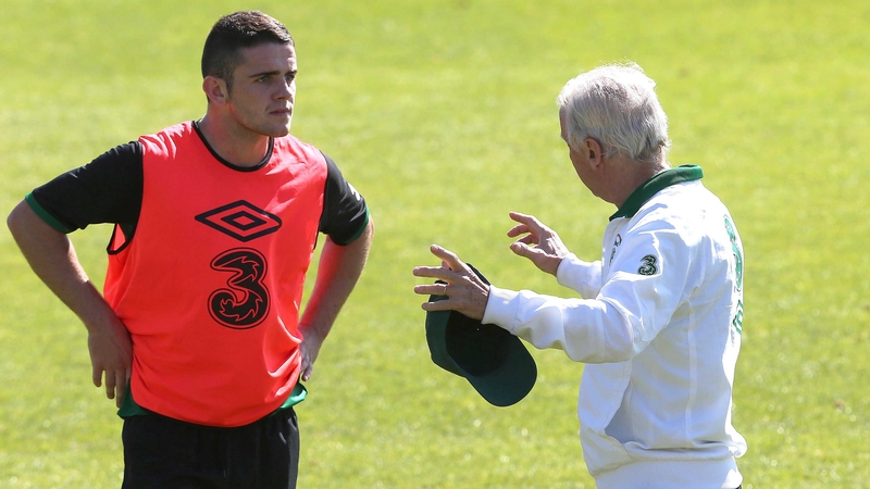 Robbie Brady receives instructions from Giovanni Trapattoni at training in London