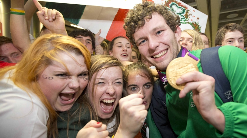 Gold medal swimmer Darragh McDonald with some fans.
