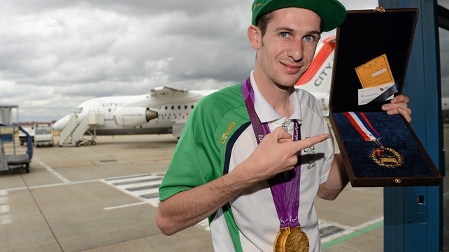 Michael McKillop with his two gold medals and Whang Youn Dai Achievement award.