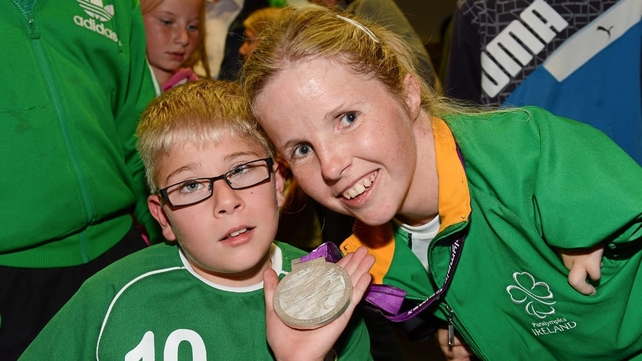 Catherine O'Neill, who won a silver medal in the discus throw -T51 with Shane Barker, age 9, from Donabate, Co Dublin.