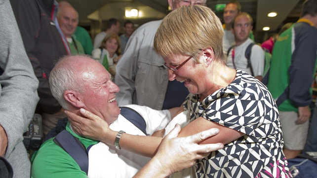 Michael Cunningham, coach with the team, is congratulated by Una McArdle.
