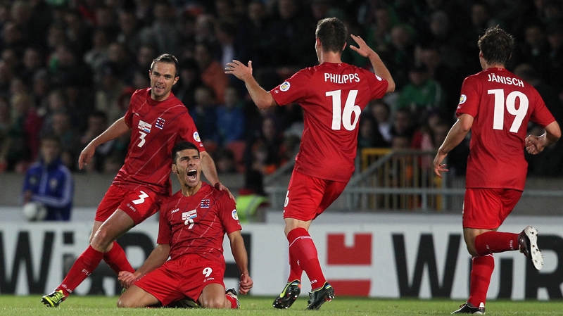 Daniel Da Mota's team-mates celebrate with the goalscorer after he earned the visitors an undeserved draw at Windsor Park