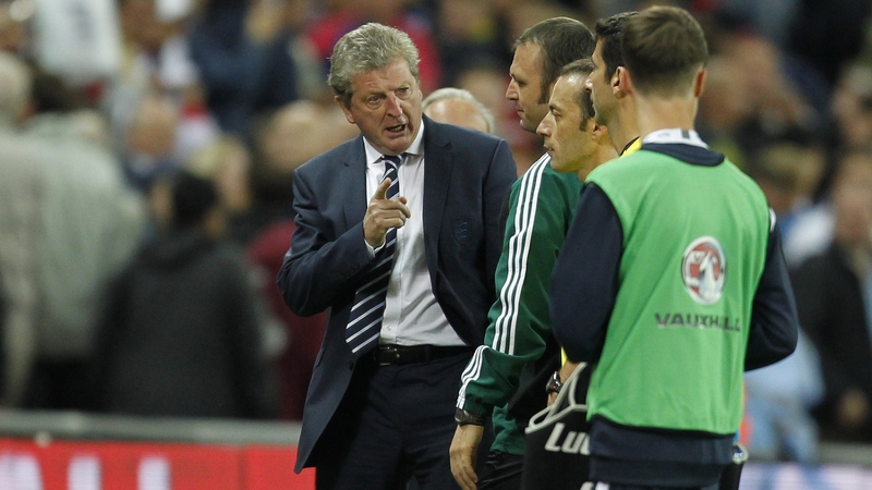 Roy Hodgson confronts Turkish referee Cuneyt Cakir after last night's match