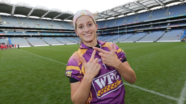 Wexford goalkeeper Mags D'Arcy celebrates winning a third successive All-Ireland title