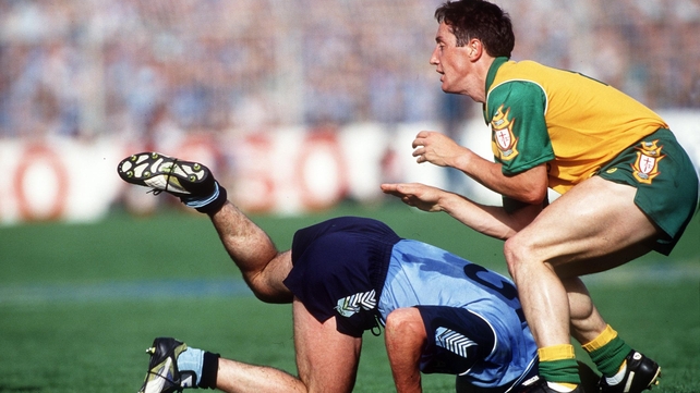 Paul Curran of Dublin collides with Jim McMullin of Donegal