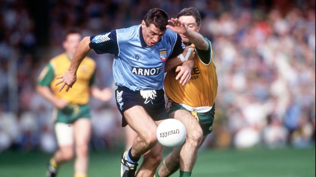 Jack Sheedy of Dublin is pursued by a certain Martin McHugh